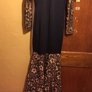 Long sleeved black and gold custom made dress